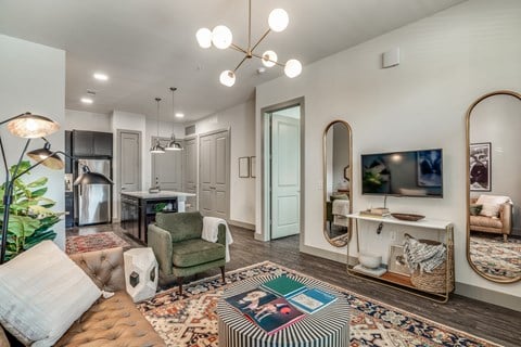 a living room with a couch and a chair